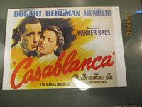 Close-up of the Casablanca movie print showing Humphrey Bogart and Ingrid Bergman with the title in bold red letters.
