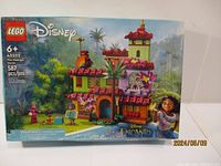 Front view of new LEGO Disney Encanto The Madrigal House 43202 box showing completed set image, characters, and branding.