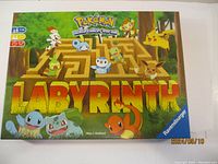 Front of the Pokemon Labyrinth board game box showing colorful Pokemon characters and game branding.