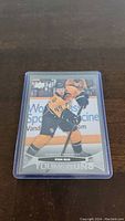 Front of Ryan Ellis Young Guns hockey card showing player image and team.
