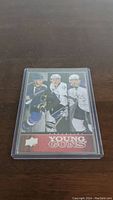Front of the Young Guns checklist card showing players Stamkos, Pietrangelo, and Doughty in their team uniforms.