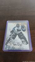 Front of Steve Shields hockey card with autograph, showing him in goalie gear for the San Jose Sharks.