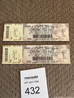 Three ticket stubs from the Oscar De La Hoya vs Manny Pacquiao boxing match, shown individually and stacked with ticket details visible.