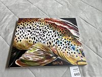 Full view of painting showing detailed brown trout fish artwork and artist signature 'Landstrom' on front.