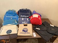 Overview of 9 vintage day and travel bags including well-known airline logos focused on Pan Am, United Way, Jetset Tours, and others.