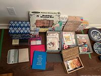 Full view of lot showing rubber stamp set, journals, memory boxes, note cards, sticky notes