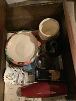 Top view of all items in the wooden box showing five items including the large bowl, figurine, and vases.