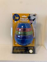 JW Pet Treat Tower dog toy in original retail packaging, new condition.