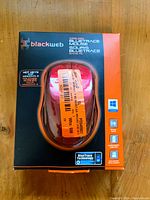 Front of retail boxed Blackweb wireless Bluetrace mouse highlighting package and mouse visibility.