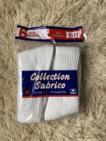Photo of original packaging showing 6 pairs of white Collection Sabrico sport socks, size 9-11, new condition.