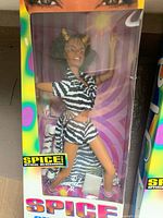 Photo of new in box Spice Girls Barbie doll dressed in zebra print outfit, unopened in original packaging.
