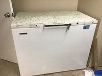 White Baycrest chest freezer with floral patterned top, showing exterior condition and size.
