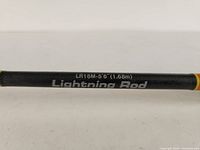 Close-up of rod label showing model LR16M, length 5'6" (1.68m), Lightning Rod branding.