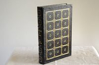 Front cover of a black leather bound book titled Fathers & Sons by Ivan Turgenev with gold embossing forming a grid pattern.