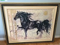Front view of framed print showing black horse with detailed frame and matting