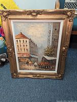 Front view of the gilt framed oil painting showing overall condition and detailing of painting and frame.