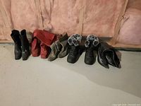 Overview of all five pairs of women's boots including high heel and winter styles, showing colors black, red, beige, and boots with fur trim.