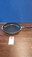 Calphalon Select 10-inch frying pan side angle showing handle and pan body