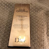 Front of gold box showing product name and description.