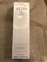 Photo of front of the Dr. Barbara Sturm cleanser box showing branding, product type, and volume.