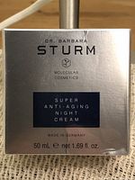 Front of sealed box showing brand, product name, size and origin