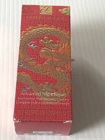 Front view of the red box with dragon design and product name.
