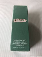Front view of the green box showing product name and size; unopened and sealed.