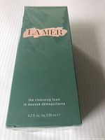 Front of the sealed box showing La Mer branding and product name 'the cleansing foam' with size 4.2 fl. oz./125 ml.