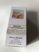 Front view of the sealed fragrance box showing the Replica series branding, fragrance and period description, and volume (30 ml).