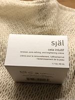 Photo of the front of the Sjal Cela Intuitif cream box showing product name, purpose, size.
