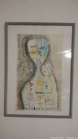 Full view of framed abstract print showing overall condition