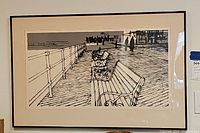 Full front view of framed lithograph showing entire image, mat, frame and glass.