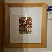 Framed lithograph front view hung on wall