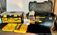 Overview photo showing Extech earth resistance tester in yellow case with cables, two DeWalt tool cases, and a pair of new leather gloves.