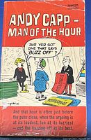 Photo of front cover of Andy Capp - Man of the Hour comic book showing cartoon characters and speech bubble.