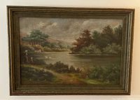 Full view of framed oil painting showing entire landscape scene and frame.