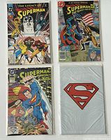 Four DC Superman comic books displayed, two on top and two below, showing front covers including The Legacy of Superman #1 and Superman IV: The Quest For Peace #1.