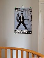 David Bowie original poster from Labatt Sound Vision Tour 1990, hung on wall with green tape; visible in good condition from distance.