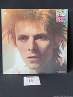Front cover of David Bowie Space Oddity vinyl LP showing close-up portrait of Bowie
