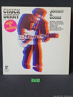 Front cover of Chuck Berry vinyl LP album with stylized multi-exposure colorful image and "reelin' & rocking" sticker.