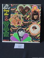 Front cover of 'The Best of Sonny & Cher' vinyl LP with colorful psychedelic design and portraits of Sonny & Cher.