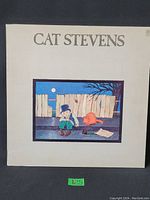 Front cover of Cat Stevens vinyl LP with a cartoon illustration of a man and a cat.