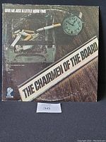 Front cover of The Chairmen of the Board vinyl LP showing album artwork with ashtray, cigarette, stopwatch, and band name.