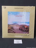 Front cover of Barbra Streisand Stoney End vinyl LP showing desert scene and titled 'QUADRAPHONIC'.