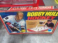 Front view of the Bobby Hull Hockey game box showing game artwork, product name and age indication (1971).