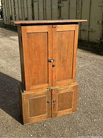 Full front view of two-piece pine cabinet assembled.