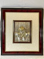 Full view of framed silver relief plaque depicting Christ on the cross, showing overall size and frame detail.