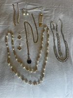 Overview of all jewelry items arranged on a flat surface