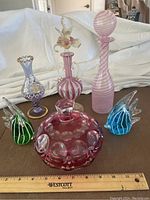 Full group shot showing all six glass pieces on table.