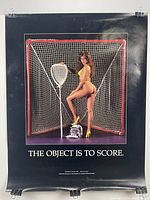 Poster titled 'The Object is to Score' featuring a model in a yellow bikini posing with lacrosse goal and stick.